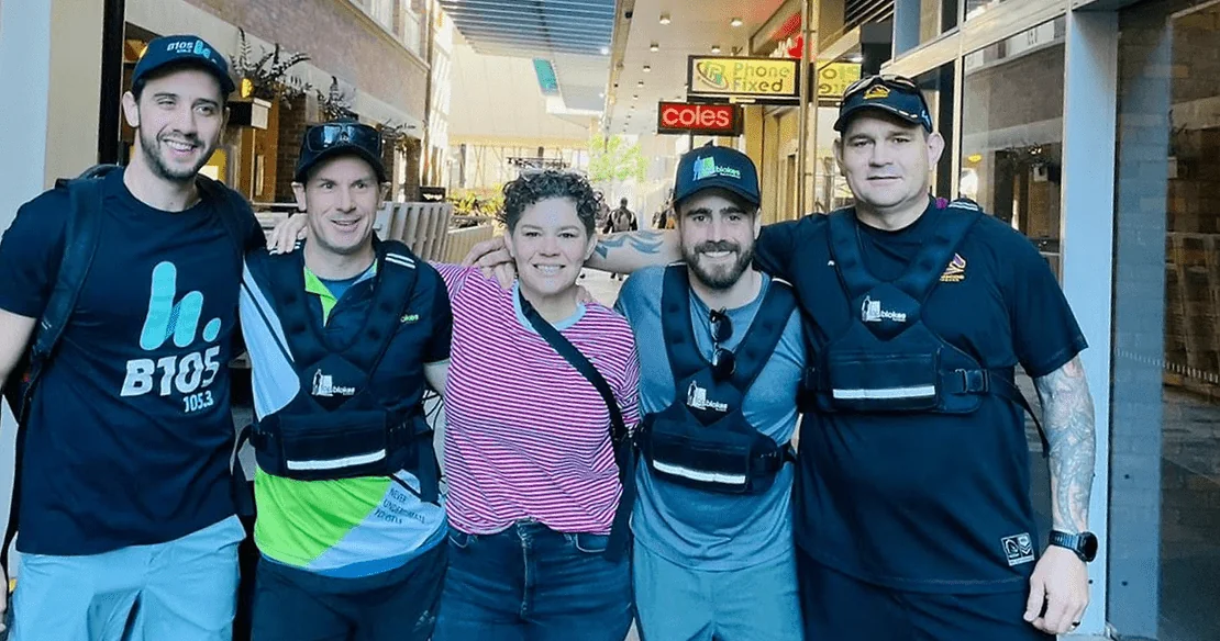 Rachel centre with Brisbane's B105 team including Matty Acton